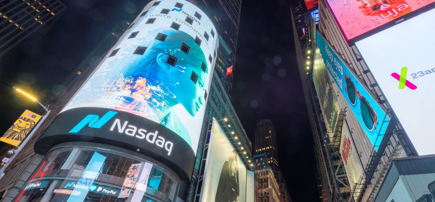 Stocks Settle Sharply Higher as Crude Prices Plunge and Chipmakers Soar